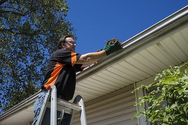 rusted rain gutter undergoing repair in Bucyrus